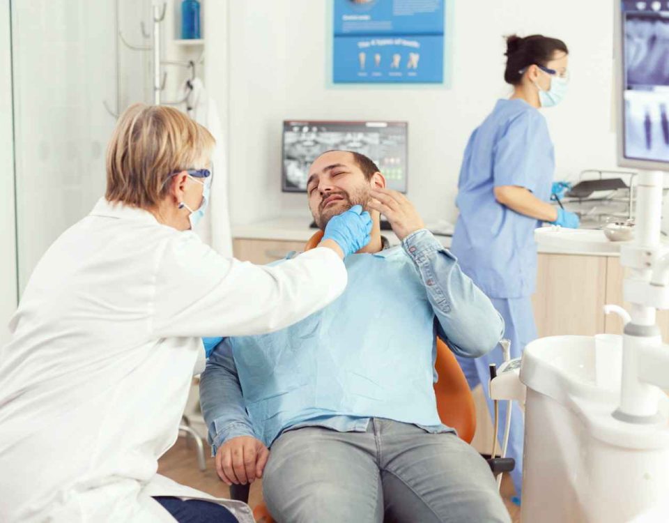 stomatologist doctor checking patient tooth pain stomatology appointment